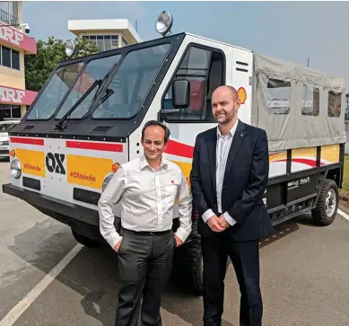  ??  ?? Nitin Prasad, Chairman, Shell Companies in India, and Mike Brown, Advanced Product and Business Strategy Director, GMD, along with the OX Truck.