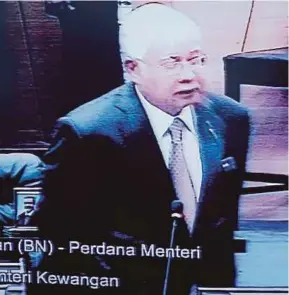  ?? [FOTO MUHD ZAABA ZAKERIA/BH] ?? Najib menjawab soalan pada sesi perbahasan di Dewan Rakyat , semalam.