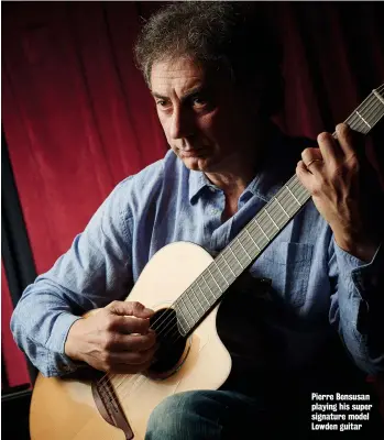  ?? ?? Pierre Bensusan playing his super signature model Lowden guitar
