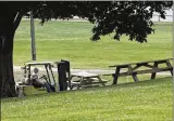  ?? CHRIS STEWART / STAFF ?? A worker at the Montgomery County Fairground­s moves picnic tables Friday in preparatio­n for the last fair in Dayton before moving to a new site at Judge Arthur O. Fisher Park in Jefferson Twp.