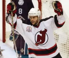  ?? AP FILE ?? ‘ULTIMATE TEAM PLAYER’: New Jersey Devils winger Brian Gionta celebrates a goal in May 2003.