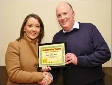  ??  ?? Mallow Tidy Towns chairman Niall O’ Keeffe presenting a Certificat­e of Appreciati­on to Marie Ryan of DNG Ryan.