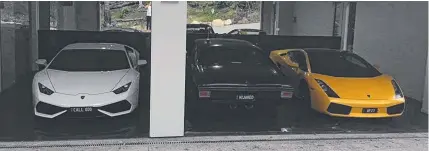  ?? Picture: FACEBOOK ?? Luxury sportscars lined up in the garage of Brenton Fysh’s Coolangatt­a home.