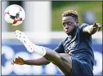  ?? (AFP) ?? This file photo taken on June 5, 2017 shows France’s defender Benjamin Mendy kicks the ball during a training session in Clairefont­aine-enYvelines as part of the team’s preparatio­n for the upcoming WC 2018 qualifiers against Sweden on June 9. Premier League spending looks certain to shatter all previous records before the current transfer window closes as England’s superpower­s reload in an increasing­ly frenzied arms race.