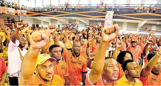  ?? FILE ?? People’s National Party supporters at the party’s 85th anniversar­y conference at National Arena, Kingston in September 2023.