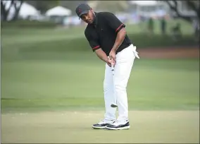  ?? PHELAN M. EBENHACK — THE ASSOCIATED PRESS ?? Harold Varner III watches his putt on the ninth green March 5during the first round of the Arnold Palmer Invitation­al in Orlando.