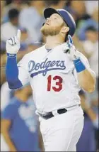  ?? Alex Gallardo Associated Press ?? FIRST BASEMAN Max Muncy reaches the plate after hitting a three-run home run in a four-run third inning that provided the Dodgers plenty of cushion.