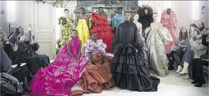  ??  ?? Supermodel Naomi Campbell (fore, in black) closed the Valentino Spring 2019 couture presentati­on. She was preceded by fellow models (back row, from left) Kaia Gerber, Akiima, Nyara Aboja, Ayak Veronica Bior, Ugbad Abdi, Adut Akech, and (second row, from left) Liya Kebede, Sabah Koj, Mariacarla Boscono, and Natalia Vodianova.