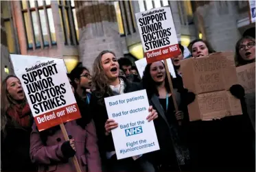  ??  ?? Junior doctors protest against the imposition of a new contract in 2016