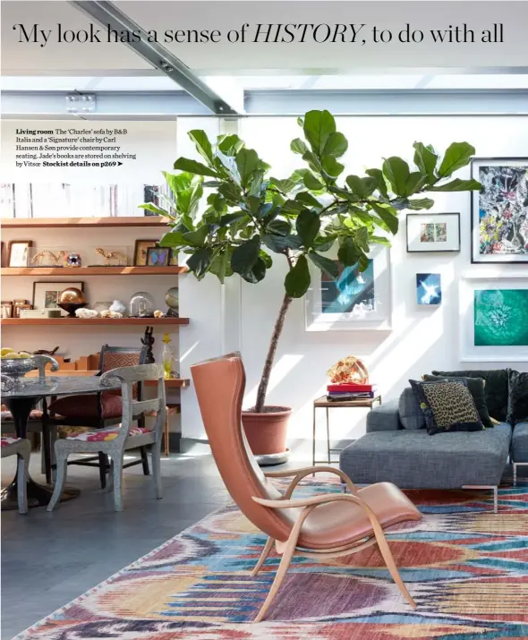  ??  ?? Living room The ‘Charles’ sofa by B&amp;B Italia and a ‘Signature’ chair by Carl Hansen &amp; Søn provide contempora­ry seating. Jade’s books are stored on shelving by Vitsoe Stockist details on p269 ➤