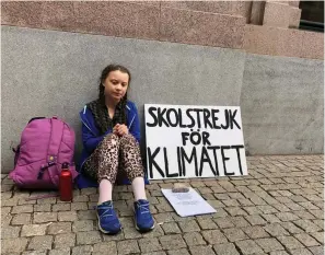  ??  ?? The Swedish girl Greta Thunberg went “on strike” from her school and took a seat in front of the Swedish Parliament in Stockholm to raise climate awareness. The 15-year-old girl sat in front of the Parliament every day during school hours with a sign reading ‘School Strike for the Climate’.