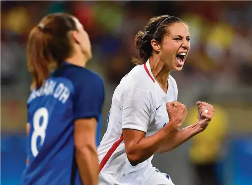  ?? Pedro Vilela / Getty Images ?? Dash midfielder and Team USA star Carli Lloyd knows how to deliver on the big stage as the team aims for its fourth straight gold.