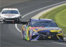  ?? Michael Reaves / Getty Images ?? Kyle Busch, right, and Kevin Harvick are tied for first in the season standings going into the first race of the playoffs on Sunday in Las Vegas.