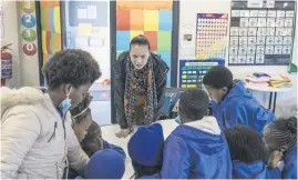  ?? ?? ATTENTIVE. Assistant principal of curriculum and instructio­n, Taneal Padayachie, talks to pupils in her classroom at Ubuntu Pathways complex.