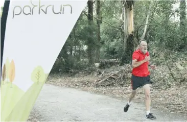  ??  ?? Michael Winterton of Labertouch­e crosses the line during Warragul parkrun’s 160th event, which doubled as a third birthday celebratio­n for the club.