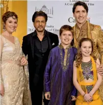  ?? PTI ?? Justin Trudeau, his wife Sophie Grégoire, daughter and son with actor Shah Rukh Khan in Mumbai on Tuesday. —