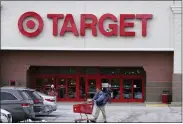  ?? CHARLES KRUPA - THE ASSOCIATED PRESS ?? A Target store on Monday in Salem, N.H. Target reported on Tuesday a 43% drop in profits and a slight uptick in sales for the holiday quarter.