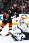  ??  ?? SAN JOSE SHARKS goaltender Martin Jones makes a save on a shot by Anaheim Ducks forward Corey Perry (10) in the second period of the Sharks’ 3-2 road victory over the Ducks on Saturday night to claim a 2-0 lead in the firstround playoff series.