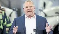  ?? COLE BURSTON THE CANADIAN PRESS ?? Doug Ford said Ontarians will be thrilled by upcoming reforms.