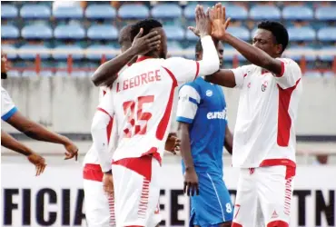  ??  ?? Enugu Rangers’ Ifeanyi George celebrates his goal against Rivers United with team mates