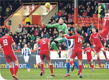  ??  ?? Aberdeen’s Freddie Woodman in action against Kilmarnock