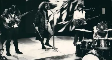  ??  ?? BELOW: TULL ON TOP OF THE POPS IN 1969.