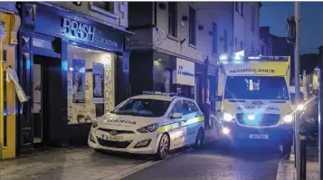  ??  ?? Gardaí and the ambulance at the scene on South Main Street.