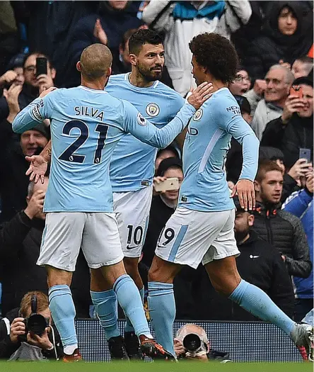  ?? AFP ?? Sergio Aguero, centre, scored his 177th goal for Manchester City to break Eric Brook’s record that had stood for 79 years