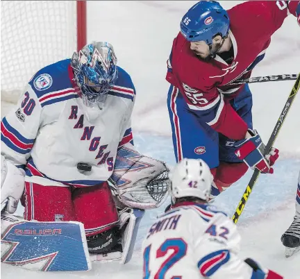  ?? DAVE SIDAWAY ?? Rangers goalie Henrik Lundqvist stops the puck with Habs forward Andrew Shaw on the doorstep Thursday. Shaw is one of several Canadiens forwards who have yet to score in the series. Montreal now faces eliminatio­n in Game 6, which takes place Saturday...