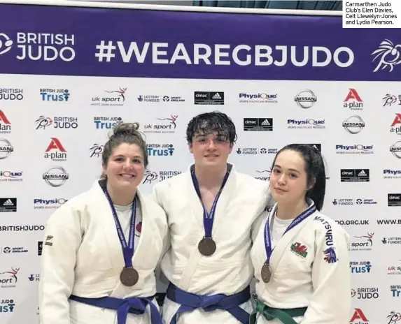  ??  ?? Carmarthen Judo Club’s Elen Davies, Celt Llewelyn-Jones and Lydia Pearson.