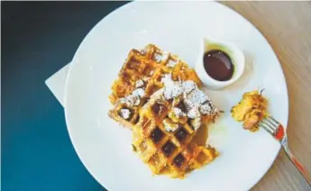  ??  ?? Carrot buttermilk waffles at The Bindery.