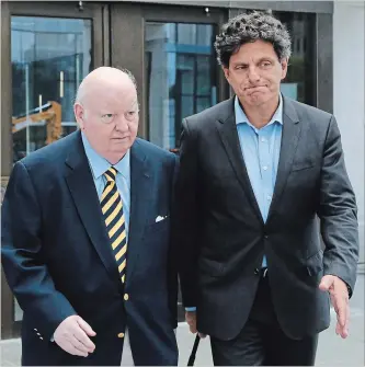  ?? PATRICK DOYLE THE CANADIAN PRESS ?? Senator Mike Duffy, left, leaves the Ottawa courthouse with his lawyer, Lawrence Greenspon, on Wednesday.