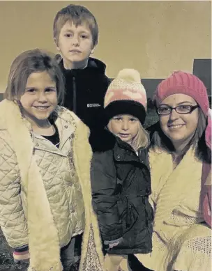  ??  ?? Ceri Williams with Laylah , left, Danny and Leigh and, inset, the advent calendar with the mouldy chocolates