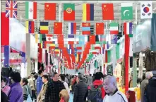  ?? WANG LUXIAN / FOR CHINA DAILY ?? Visitors browse the first China Nanjing Foreign Trade Fair in Nanjing, Jiangsu province, in November.