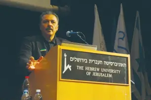  ?? (Reuven Remez/Truman Institute) ?? SYRIAN OPPOSITION figure Issam Zeitoun speaks in Jerusalem yesterday during an event sponsored by Hebrew University.