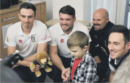  ??  ?? From left: Durham’s James Weighell, Ryan Pringle, Neil Killeen and Will Smith spread a little happiness at the Great North Children’s Hospital.