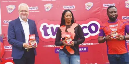  ??  ?? L-R: Anders Einarsson, managing director; Tiwa Savage, Twisco brand ambassador, and Abiodun Ayodeji , marketing manager, all of Promasidor Nigeria Limited, during the official lunch of Twisco chocolate drink and unveiling of Tiwa Savage as the brand ambassador in Lagos, recently