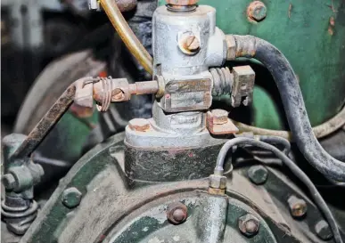  ??  ?? The injection pump was made by Bryce-berger and we’re sure 99.995 percent of you never heard of them. It was a simple system that popped the injector at about 2,150 psi for the 1000 rpm engines, 2,850 psi for the 1500 rpm engines and 3,150 psi for the 1800 rpm engines. The governor springs and pump adjustment­s set the speed limit of the engine.