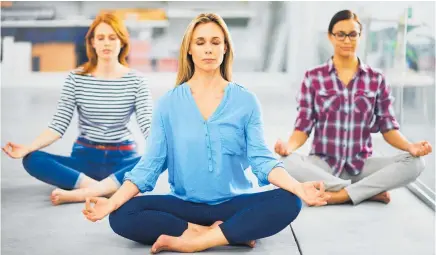  ?? Photo / Getty Images ?? Yoga, physical education classes and counsellin­g can contribute to a more productive workforce.