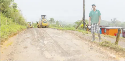  ?? . Photo: Fulton Hogan Hiways ?? Farmer, Pranesh Navindatt expressed relief when road works started after seven years