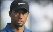  ?? KAMRAN JEBREILI — THE ASSOCIATED PRESS FILE ?? In this file photo, Tiger Woods reacts on the 10th hole during the first round of the Dubai Desert Classic golf tournament in Dubai, United Arab Emirates. Tiger Woods had the active ingredient for marijuana, two painkiller­s and two sleep drugs in his...