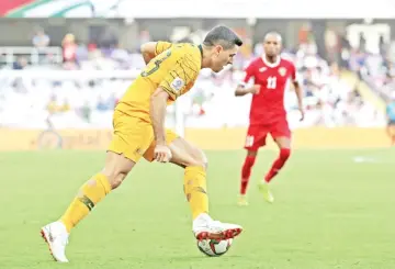  ??  ?? Celtic forward Tom Rogic stood out for Australia in their win against Palestine. - AFP photo