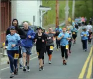  ?? TANIA BARRICKLO — DAILY FREEMAN FILE ?? In an April 28, 2019, photo, runners in the Kingston Classic 10K make their way back up Abeel Street.