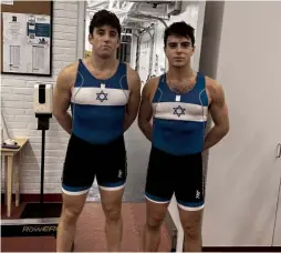  ?? (Zachary Atalay/Courtesy) ?? NATHAN (LEFT) and Asher Swidler pose in their specially designed pro-Israel unisuit, which they use as members of the Brown Crew Team.
