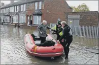  ?? PICTURE: TONY JOHNSON ?? IMPACT: Many residents had to be rescued from their homes in Yarborough Terrace in Bentley, Doncaster.