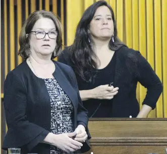  ?? THE CANADIAN PRESS ?? Independen­t MPs Jane Philpott and Jody Wilson-Raybould vote in the House of Commons on Parliament Hill in Ottawa on Tuesday. Both former Liberal ministers were ejected from Prime Minister Justin Trudeau’s caucus.