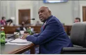  ?? J. SCOTT APPLEWHITE — THE ASSOCIATED PRESS ?? Phillip Washington, the nominee to become administra­tor of the Federal Aviation Administra­tion, testifies before the Senate Commerce, Science and Transporta­tion Committee at the Capitol in Washington on Wednesday.