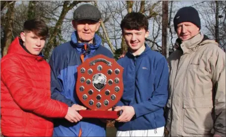  ??  ?? Shield for Best Boys School was won jointly by Tralee CBS and St. Brendans Killarney and was presented to team captains, John Ward (Tralee CBS) and Fergal Murphy (St. Brendans) by Lorcan Murphy and Damien McLoughlin, of Kerry Schools Athletics Board.