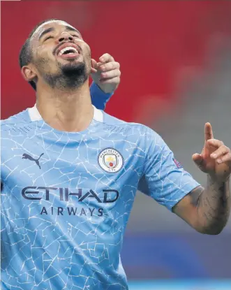  ??  ?? Blue heaven: Manchester City’s Gabriel Jesus (right) and Bernardo Silva celebrate their side’s second goal