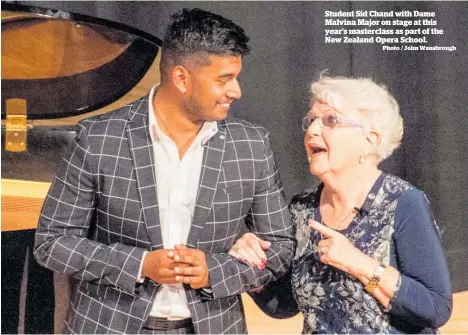  ?? Photo / John Wansbrough ?? Student Sid Chand with Dame Malvina Major on stage at this year’s masterclas­s as part of the New Zealand Opera School.